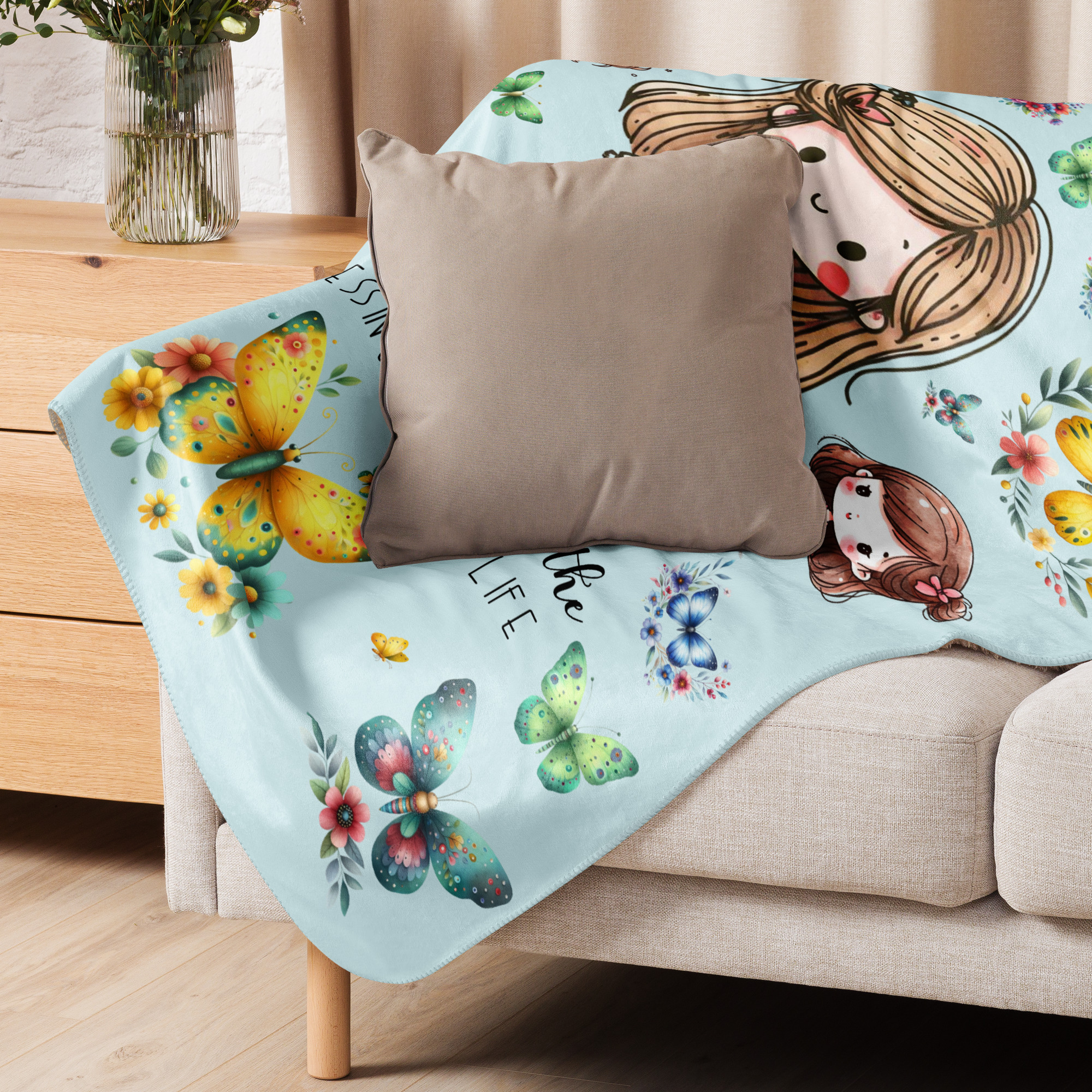 positive affirmation blankets for kids, a cute sherpa blanket on a couch. 