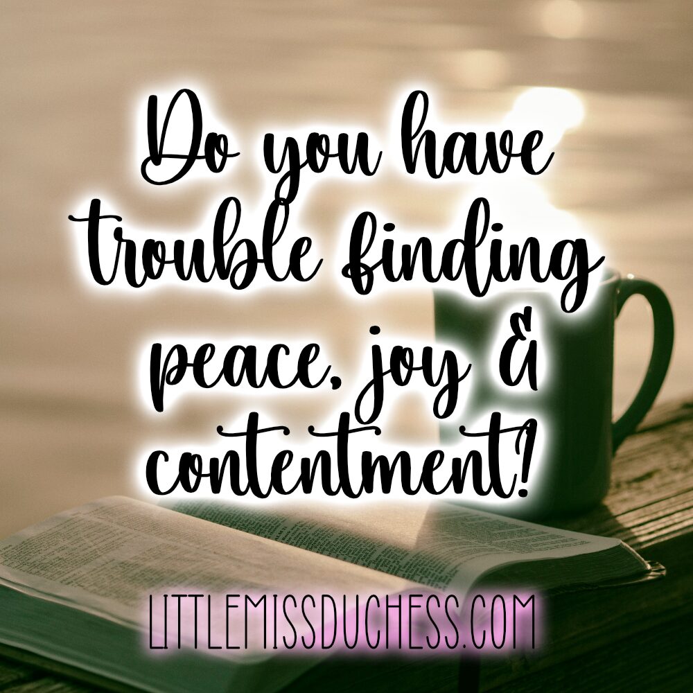 a picture of an open bible and a cup of coffee with the text overlay, do you have trouble finding peace, joy and contentment? representing one of the symptoms of trauma